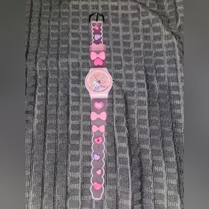 (Brand New) Hello Kitty Pink wristwatch with heart and bowtie decorated straps